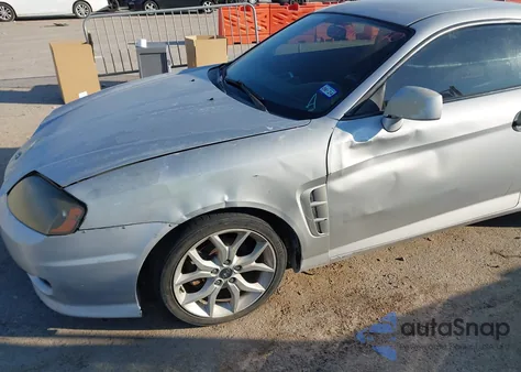 2005 Hyundai Tiburon Gs z USA, uszkodzony, nr VIN KMHHM65D65U179114